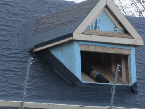 Dormer with roofing underlayment mid-install